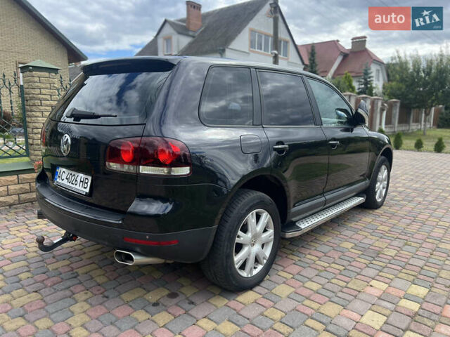 Черный Фольксваген Туарег, объемом двигателя 3 л и пробегом 244 тыс. км за 11700 $, фото 4 на Automoto.ua
