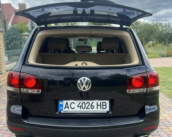 Черный Фольксваген Туарег, объемом двигателя 3 л и пробегом 244 тыс. км за 11700 $, фото 5 на Automoto.ua