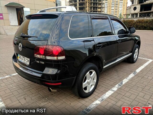 Чорний Фольксваген Туарег, об'ємом двигуна 3 л та пробігом 198 тис. км за 11300 $, фото 4 на Automoto.ua