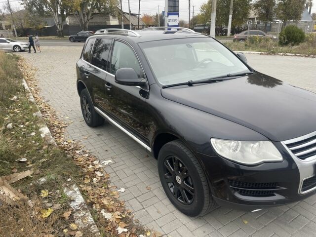 Черный Фольксваген Туарег, объемом двигателя 3 л и пробегом 373 тыс. км за 5400 $, фото 1 на Automoto.ua