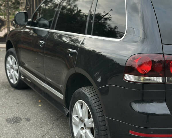 Черный Фольксваген Туарег, объемом двигателя 4.9 л и пробегом 340 тыс. км за 7900 $, фото 7 на Automoto.ua