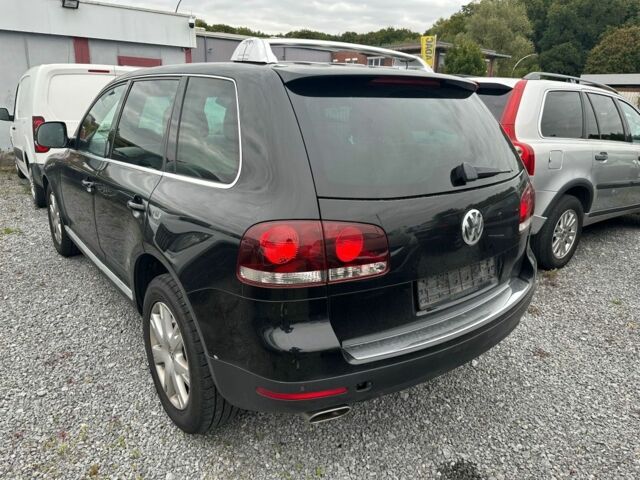 Черный Фольксваген Туарег, объемом двигателя 3 л и пробегом 312 тыс. км за 7300 $, фото 2 на Automoto.ua