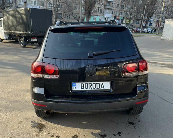 Чорний Фольксваген Туарег, об'ємом двигуна 2.97 л та пробігом 300 тис. км за 9450 $, фото 3 на Automoto.ua