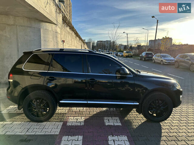 Чорний Фольксваген Туарег, об'ємом двигуна 3 л та пробігом 380 тис. км за 10500 $, фото 2 на Automoto.ua