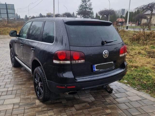Чорний Фольксваген Туарег, об'ємом двигуна 3 л та пробігом 250 тис. км за 6648 $, фото 6 на Automoto.ua
