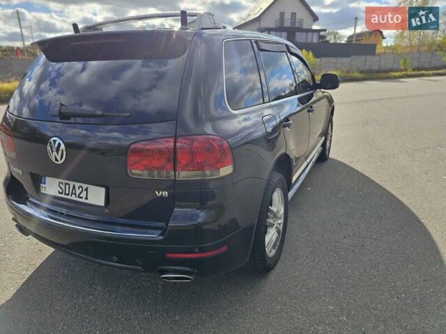 Черный Фольксваген Туарег, объемом двигателя 4.2 л и пробегом 356 тыс. км за 11000 $, фото 2 на Automoto.ua
