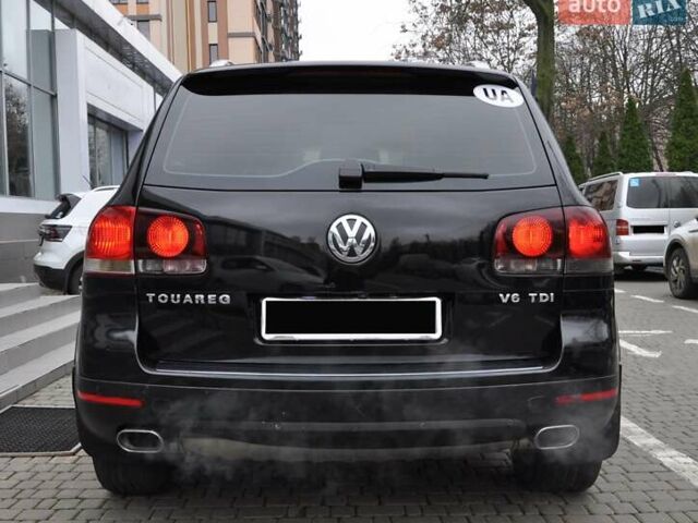 Черный Фольксваген Туарег, объемом двигателя 3 л и пробегом 335 тыс. км за 9803 $, фото 4 на Automoto.ua