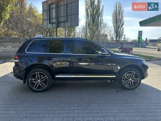 Черный Фольксваген Туарег, объемом двигателя 4.2 л и пробегом 286 тыс. км за 8999 $, фото 44 на Automoto.ua
