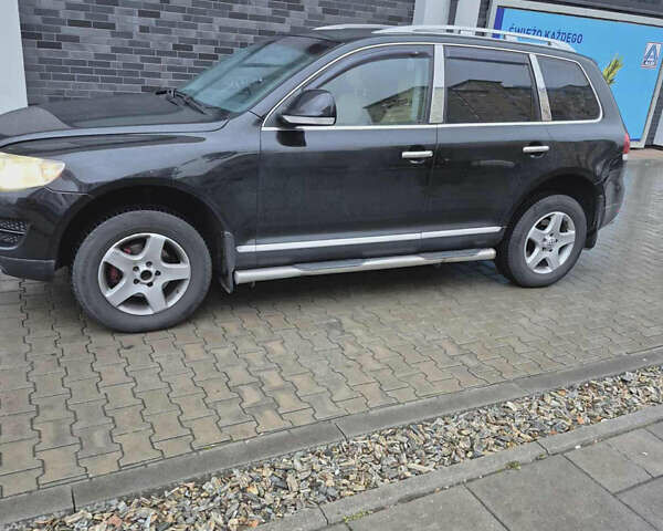 Чорний Фольксваген Туарег, об'ємом двигуна 2.5 л та пробігом 308 тис. км за 10000 $, фото 19 на Automoto.ua