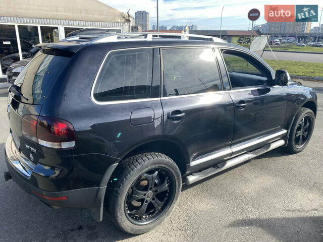 Черный Фольксваген Туарег, объемом двигателя 3 л и пробегом 240 тыс. км за 13000 $, фото 5 на Automoto.ua