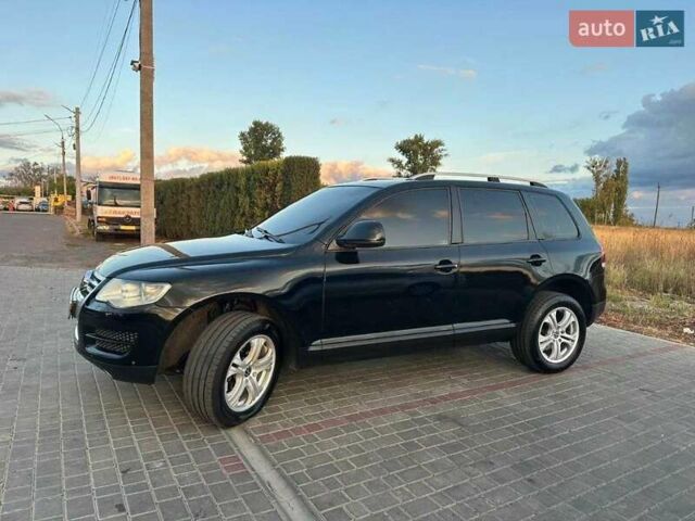 Черный Фольксваген Туарег, объемом двигателя 3 л и пробегом 198 тыс. км за 13086 $, фото 5 на Automoto.ua