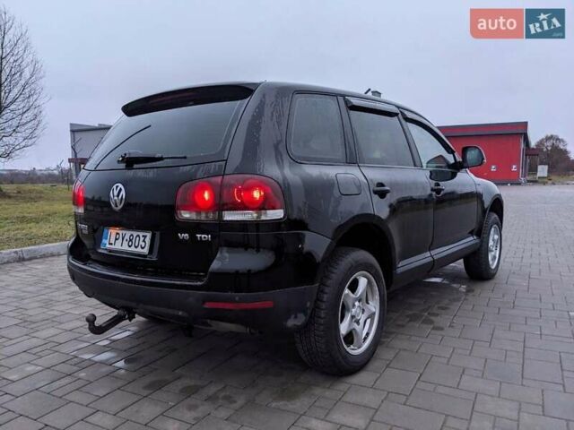 Черный Фольксваген Туарег, объемом двигателя 3 л и пробегом 305 тыс. км за 5850 $, фото 1 на Automoto.ua