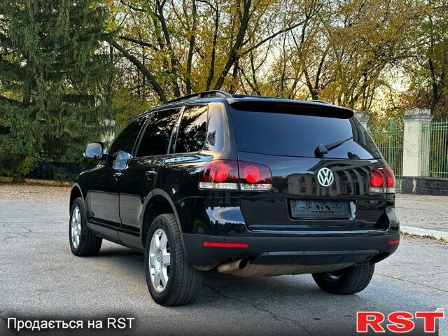 Фольксваген Туарег 2008 в Желтых Водах на Automoto.ua Черный Фольксваген Туарег, объемом двигателя 3 л и пробегом 221 тыс. км за 9800 $, фото 5 на Automoto.ua