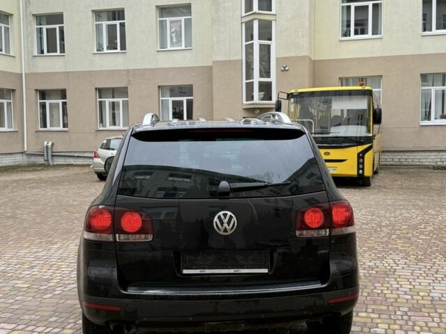 Чорний Фольксваген Туарег, об'ємом двигуна 3 л та пробігом 300 тис. км за 6490 $, фото 3 на Automoto.ua