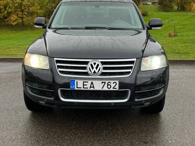 Черный Фольксваген Туарег, объемом двигателя 3 л и пробегом 280 тыс. км за 4900 $, фото 2 на Automoto.ua