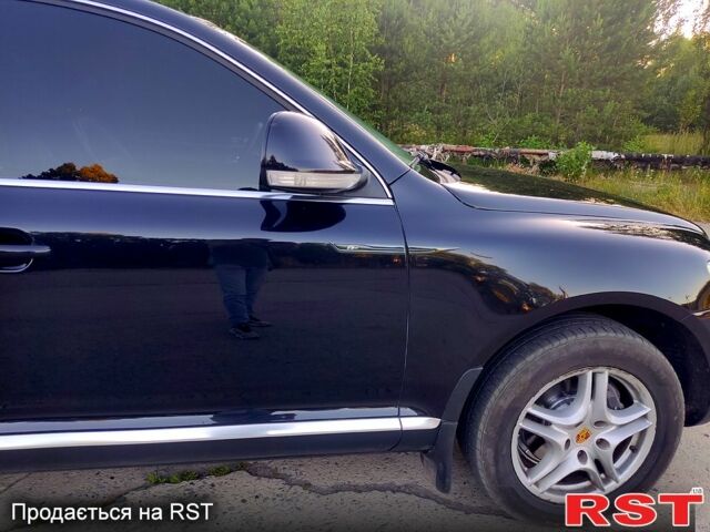 Чорний Фольксваген Туарег, об'ємом двигуна 3 л та пробігом 297 тис. км за 11777 $, фото 2 на Automoto.ua