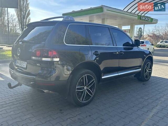 Черный Фольксваген Туарег, объемом двигателя 4.2 л и пробегом 286 тыс. км за 8999 $, фото 45 на Automoto.ua