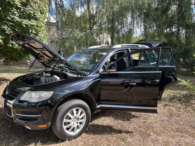 Черный Фольксваген Туарег, объемом двигателя 3.6 л и пробегом 242 тыс. км за 9500 $, фото 1 на Automoto.ua