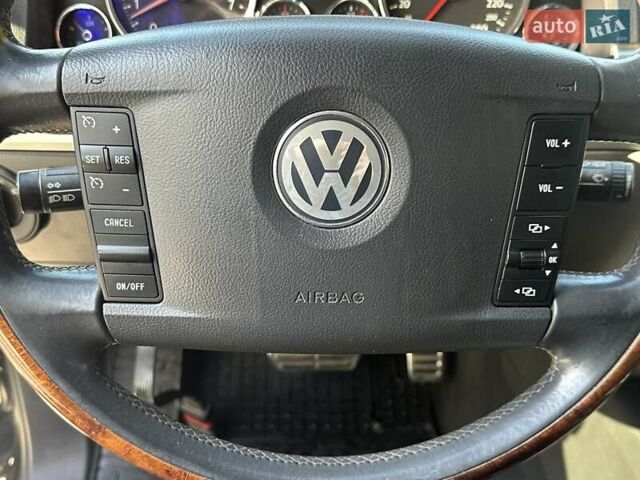 Черный Фольксваген Туарег, объемом двигателя 4.2 л и пробегом 286 тыс. км за 8999 $, фото 26 на Automoto.ua