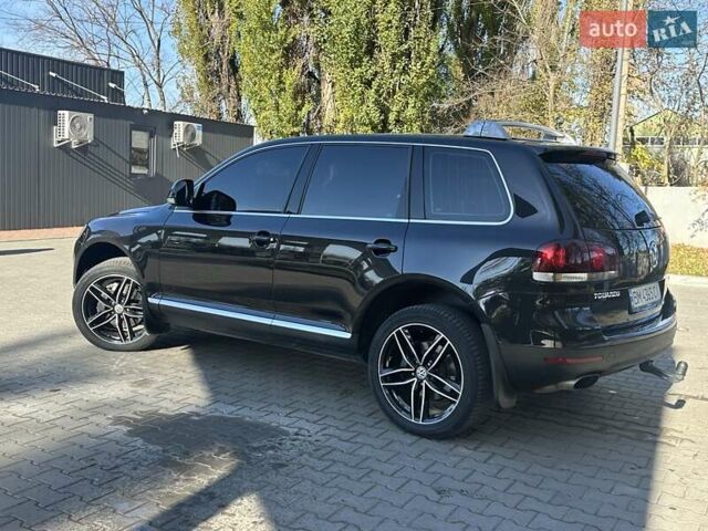 Черный Фольксваген Туарег, объемом двигателя 4.2 л и пробегом 286 тыс. км за 8999 $, фото 5 на Automoto.ua