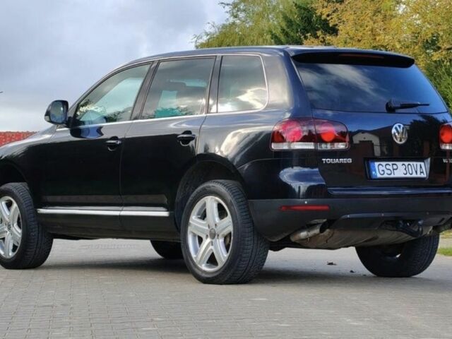 Чорний Фольксваген Туарег, об'ємом двигуна 3 л та пробігом 244 тис. км за 3116 $, фото 7 на Automoto.ua