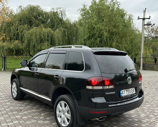 Черный Фольксваген Туарег, объемом двигателя 3 л и пробегом 235 тыс. км за 13500 $, фото 7 на Automoto.ua