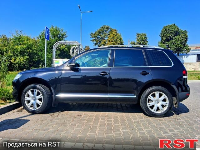 Черный Фольксваген Туарег, объемом двигателя 3 л и пробегом 337 тыс. км за 12000 $, фото 2 на Automoto.ua