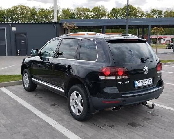 Чорний Фольксваген Туарег, об'ємом двигуна 3 л та пробігом 258 тис. км за 11500 $, фото 6 на Automoto.ua