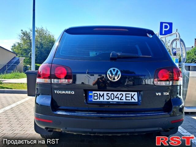 Черный Фольксваген Туарег, объемом двигателя 3 л и пробегом 337 тыс. км за 12000 $, фото 1 на Automoto.ua