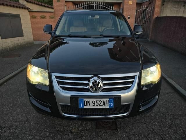 Черный Фольксваген Туарег, объемом двигателя 3 л и пробегом 287 тыс. км за 3259 $, фото 1 на Automoto.ua