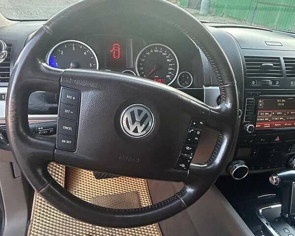 Чорний Фольксваген Туарег, об'ємом двигуна 3 л та пробігом 283 тис. км за 12200 $, фото 9 на Automoto.ua