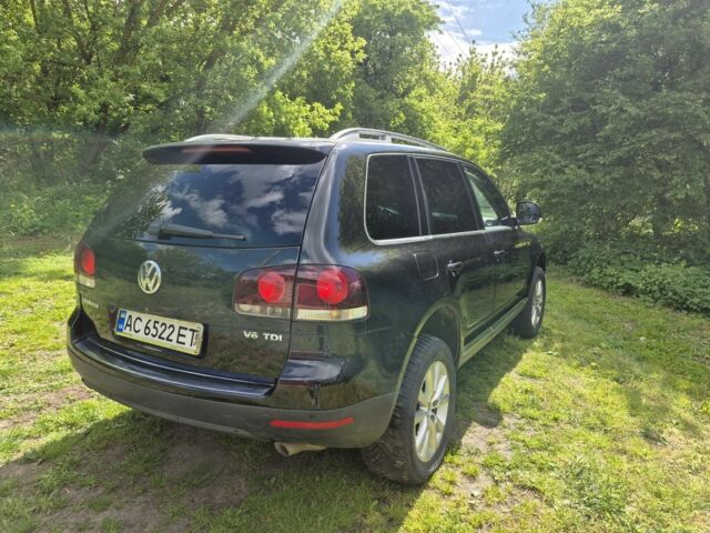 Черный Фольксваген Туарег, объемом двигателя 3 л и пробегом 372 тыс. км за 11000 $, фото 1 на Automoto.ua