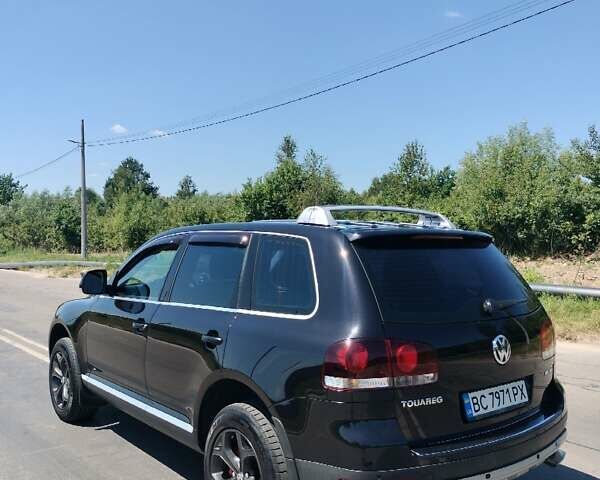 Черный Фольксваген Туарег, объемом двигателя 2.97 л и пробегом 344 тыс. км за 10950 $, фото 2 на Automoto.ua