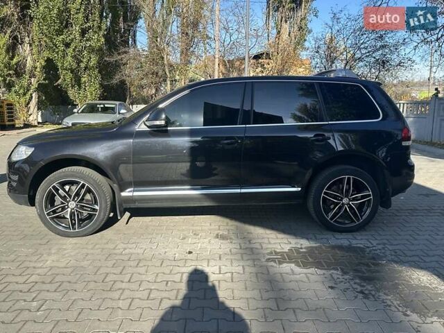 Черный Фольксваген Туарег, объемом двигателя 4.2 л и пробегом 286 тыс. км за 8999 $, фото 58 на Automoto.ua