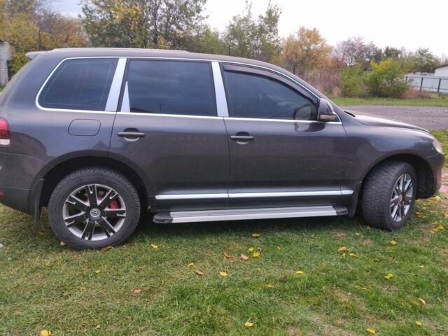 Черный Фольксваген Туарег, объемом двигателя 3 л и пробегом 300 тыс. км за 9300 $, фото 7 на Automoto.ua