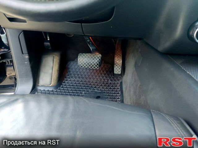 Чорний Фольксваген Туарег, об'ємом двигуна 3 л та пробігом 297 тис. км за 11777 $, фото 6 на Automoto.ua