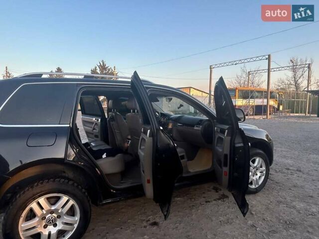Чорний Фольксваген Туарег, об'ємом двигуна 3 л та пробігом 283 тис. км за 12200 $, фото 6 на Automoto.ua