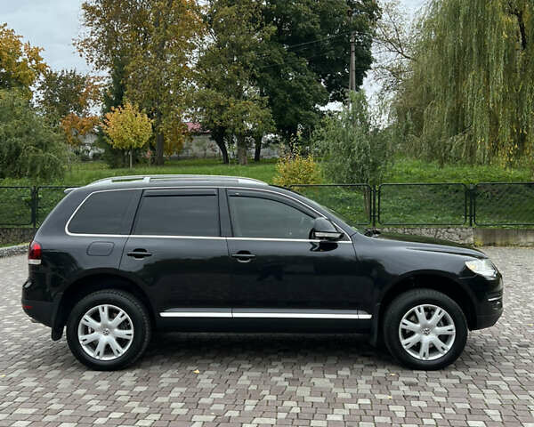 Черный Фольксваген Туарег, объемом двигателя 3 л и пробегом 235 тыс. км за 13500 $, фото 10 на Automoto.ua