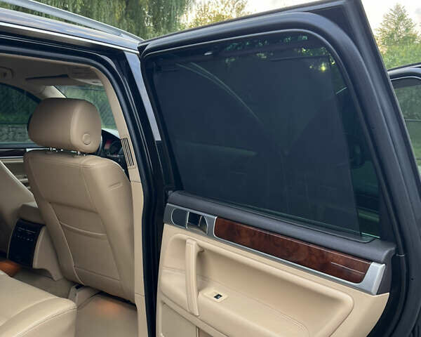 Черный Фольксваген Туарег, объемом двигателя 3 л и пробегом 235 тыс. км за 13500 $, фото 35 на Automoto.ua