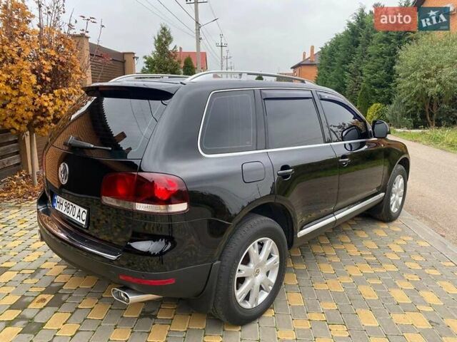 Черный Фольксваген Туарег, объемом двигателя 3 л и пробегом 360 тыс. км за 9800 $, фото 6 на Automoto.ua