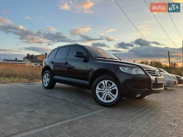 Черный Фольксваген Туарег, объемом двигателя 3 л и пробегом 198 тыс. км за 13086 $, фото 6 на Automoto.ua