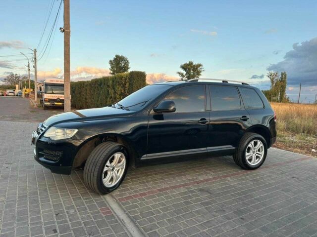 Черный Фольксваген Туарег, объемом двигателя 3 л и пробегом 198 тыс. км за 13086 $, фото 6 на Automoto.ua