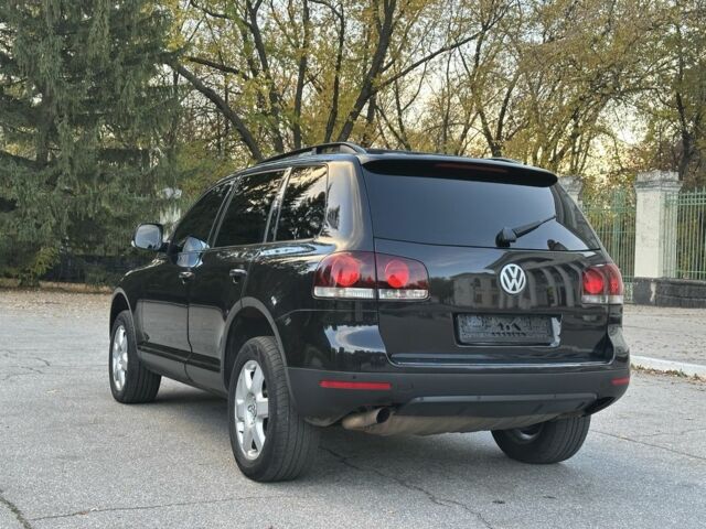 Чорний Фольксваген Туарег, об'ємом двигуна 3 л та пробігом 221 тис. км за 9800 $, фото 7 на Automoto.ua