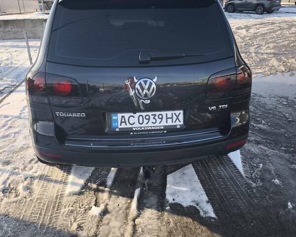 Черный Фольксваген Туарег, объемом двигателя 2.97 л и пробегом 294 тыс. км за 13000 $, фото 6 на Automoto.ua
