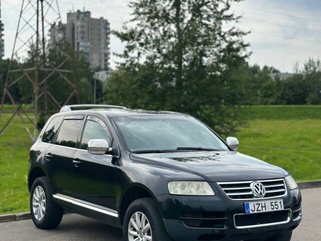 Черный Фольксваген Туарег, объемом двигателя 3 л и пробегом 281 тыс. км за 4999 $, фото 1 на Automoto.ua
