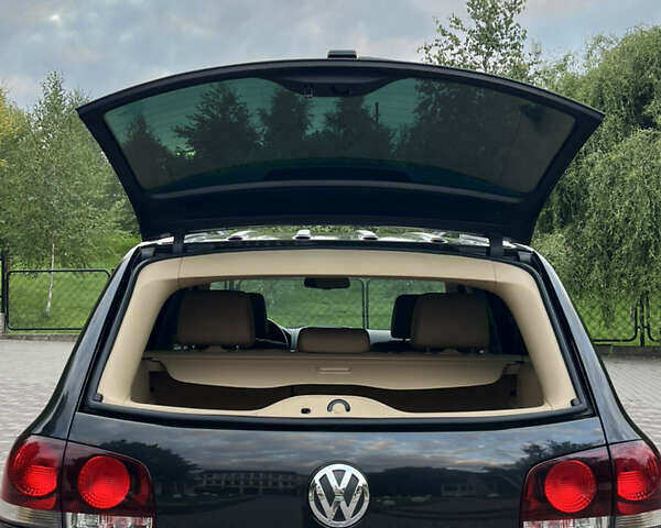 Черный Фольксваген Туарег, объемом двигателя 3 л и пробегом 235 тыс. км за 13500 $, фото 36 на Automoto.ua