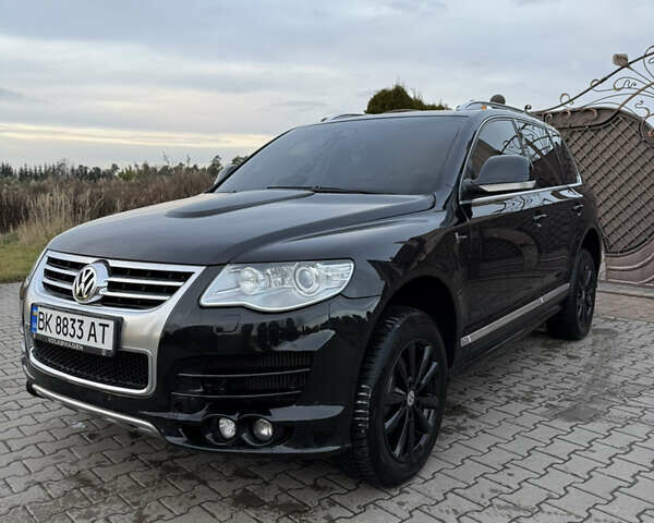 Черный Фольксваген Туарег, объемом двигателя 3 л и пробегом 217 тыс. км за 13450 $, фото 4 на Automoto.ua