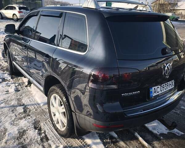 Черный Фольксваген Туарег, объемом двигателя 2.97 л и пробегом 294 тыс. км за 13000 $, фото 3 на Automoto.ua