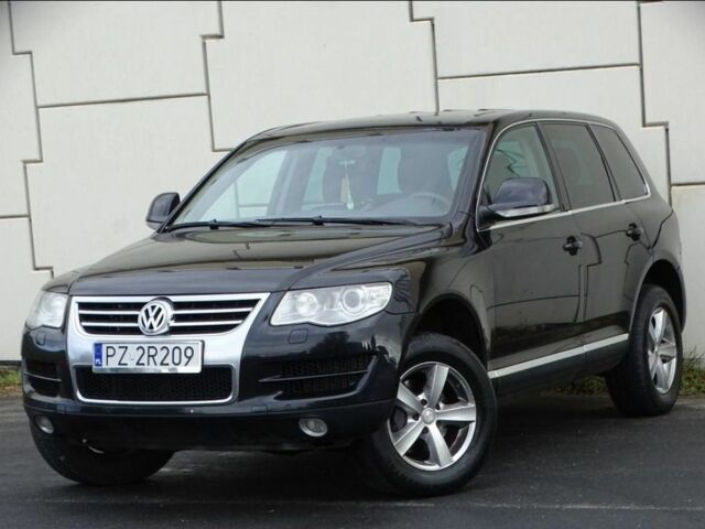 Черный Фольксваген Туарег, объемом двигателя 3 л и пробегом 260 тыс. км за 3915 $, фото 1 на Automoto.ua