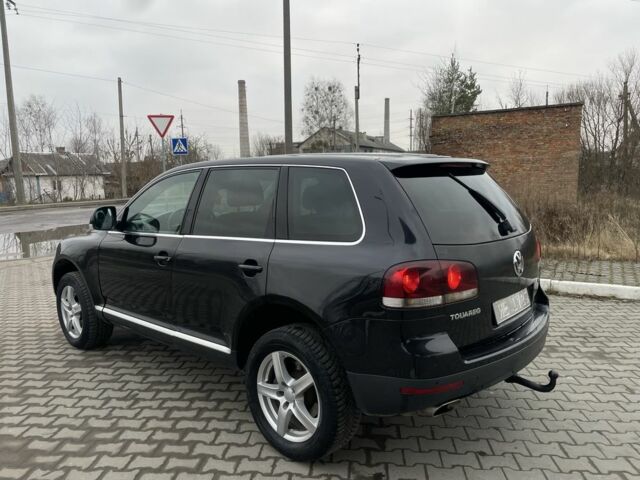 Чорний Фольксваген Туарег, об'ємом двигуна 3 л та пробігом 350 тис. км за 6200 $, фото 3 на Automoto.ua